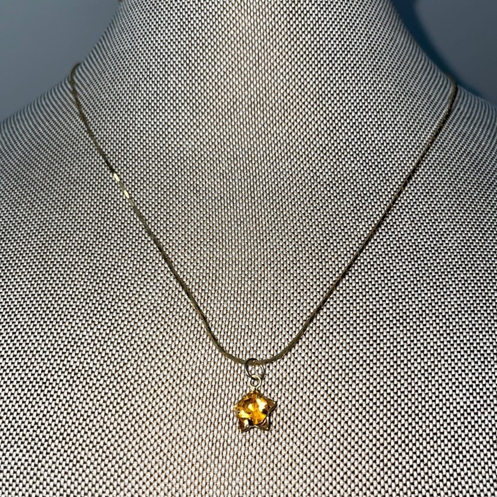 Manon Gold tone necklace with November birth stone pendant